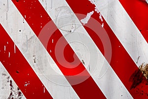 red and white diagonal stipes on flat steel sheet - caution road sign