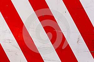 red and white diagonal stipes on flat steel sheet - caution road sign