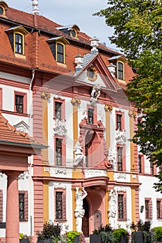 Red and white facade of the Kurmainzische Stadthalterei in Erfurt