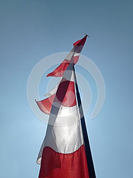 Red and white flag banner with clear cky background on Indonesia& x27;s Independence Day