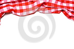 A red and white gingham tablecloth on a white background