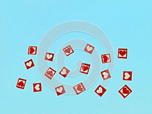 Red and white hearts on a blue background. Festive background for your projects