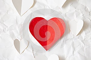 Red and white hearts paper on White crumpled paper, valentine`s day beautiful background