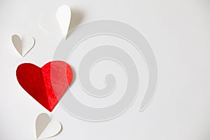 Red and white hearts paper on White paper, valentine`s day beautiful background