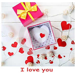 Red and white hearts on wooden background. Saint Valentine`s day concept. Love and romantic photo. Postcard for holiday. Small