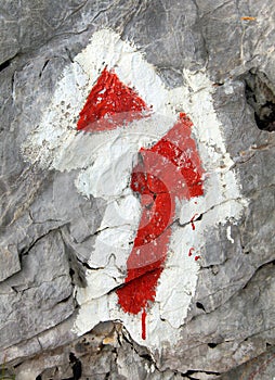 Red and white hiking trail signs symbols