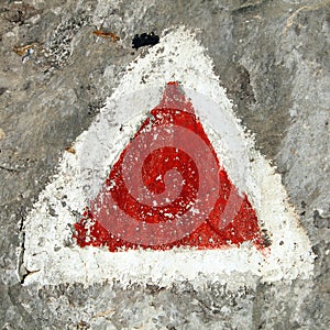 Red and white hiking trail signs symbols