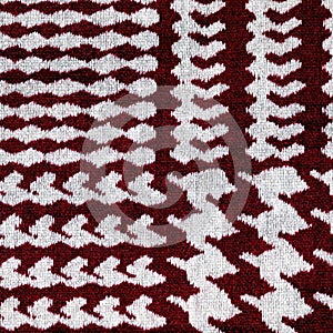 Red and white houndstooth pattern textile background