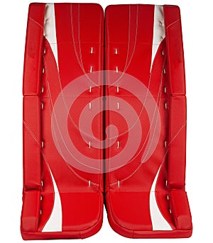 Red and white ice hockey goalie leg pads isolated on white background