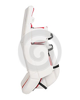 Red and white ice hockey goalie protective leg pads isolated on white background