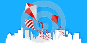 Red and white kites in the sky