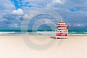 Red and white lifeguard  tower on sunny South Beach, Miami, Florida, USA