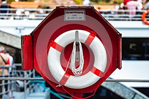 Red and white lifesaver in Passau Germany close to the river Donau