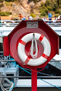 Red and white lifesaver in Passau Germany close to the river Donau