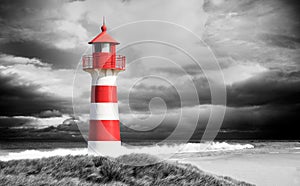 Red and white Lighthouse on a stormy day