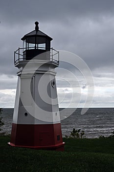 Red and White Lighthouse on a Stormy day