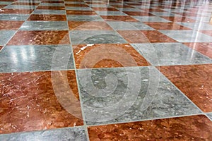Red and white marble floor
