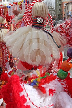 Red and white martenitsi on outdoor market for martenici on the street. Martenitsa or martenitza is given on 1st March as a symbol photo