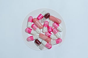 Red and white medicine capsules