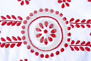 Red and white needlework