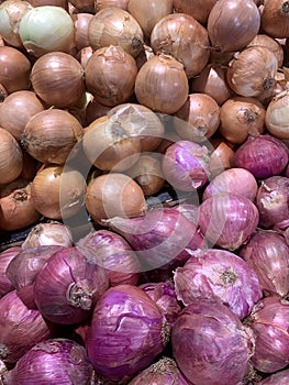 Red and White Onions in the Supermarket