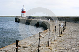 Red and white breakwater light