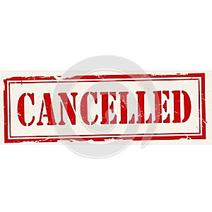 Red and white rubber stamp with the word cancelled isolated on white background