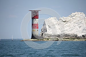 The red and white striped lighthouse at the needles in the solent photo