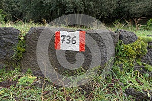 Red And White Stripes Trail Mark On Volcanic Rock In Etna Park, Sicily