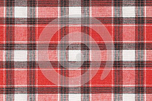 Red white tartan texture background. shirt fabric with a checkered pattern. factory material