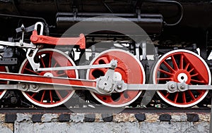 Red and white wheels of the old classic steam locomotive