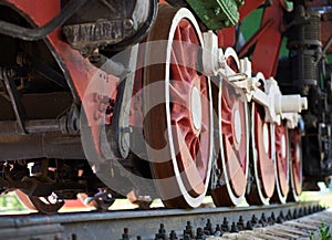 Red and white wheels of the old steam locomotive