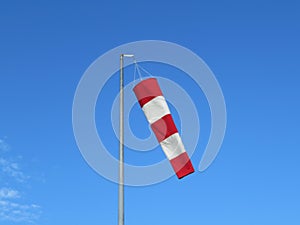 Red and white wind indicator safety signal warning photo