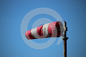 Red white windbag in the harbor of IJmuiden in the Nehterlands