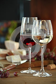 Red and white wine served with cheese