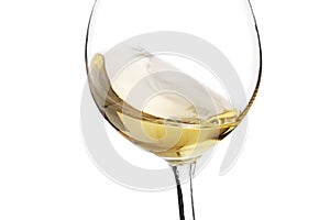 Red and white wine splash with white background, close up