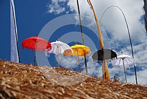 Red,white , yellow, strips beach umbrella