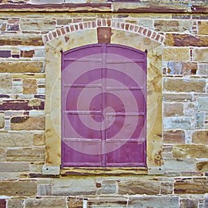 Red window, old house detail