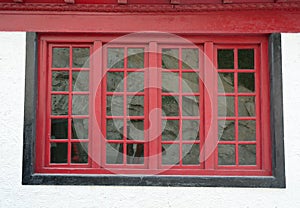 Red window at Tibetan house in Leh, India