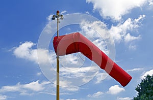 Red windsock inflated of air photo