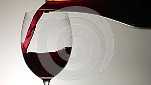 Red Wine Being Poured into Glass