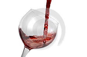 Red wine being poured in glass