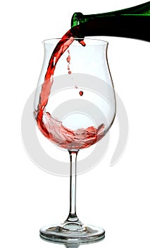 Red wine being poured into a wine glass