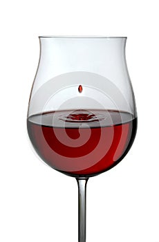 Red wine being poured into a wine glass