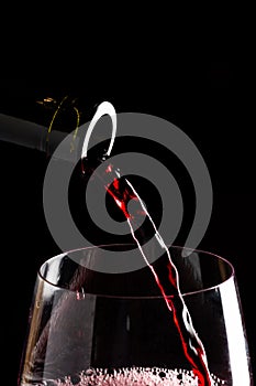 Red wine on a black background ,saved clipping path