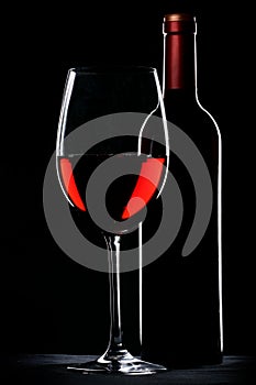 Red wine bottle and glass silhouette