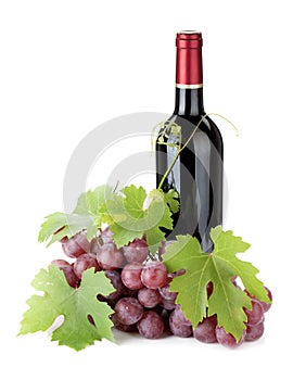 Red wine bottle and grapes