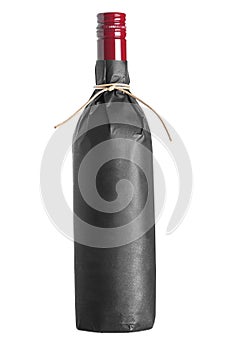 Red wine bottle wrapped in black paper