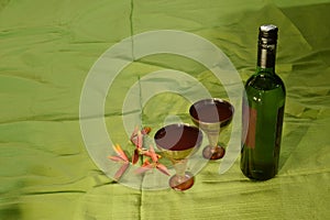 red wine bottle with glasses full