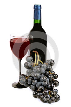 Red wine and bunch of grapes on a white background